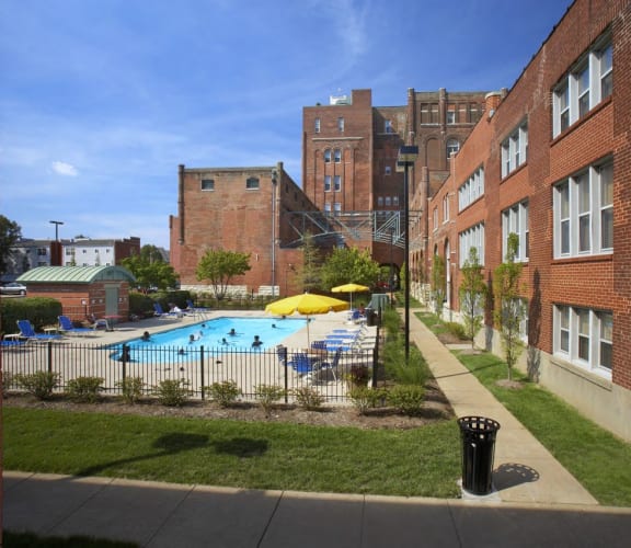 Outdoor pool and apartment building exterior-The Brewery Apartments, St. Louis, MO