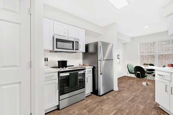 Stainless Glass Top Stoves at Caveness Farms Apartments, North Carolina, 27587