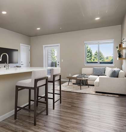 A kitchen with a bar at Spring Woods Apartments, Salem