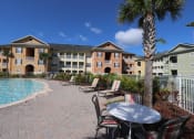 Thumbnail 2 of 51 - Academy Village Apartments Pool Exterior