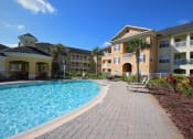 Thumbnail 1 of 51 - Academy Village Apartments Pool Exterior