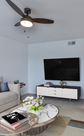 a living room with a couch and a table and a tv