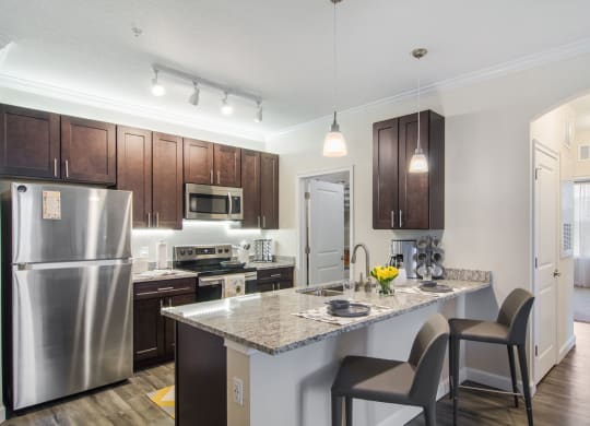 Gourmet Kitchen With Island at The Oasis at Town Center, Jacksonville, FL, 32246