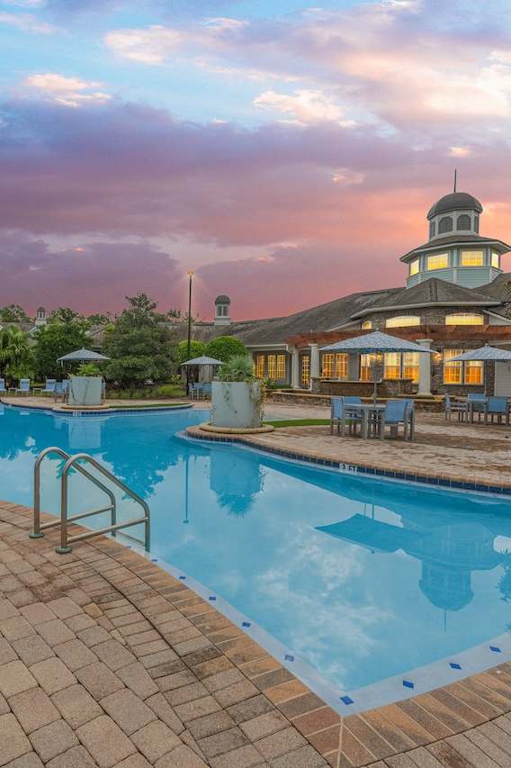 the pool area at the resort at longboat key club
