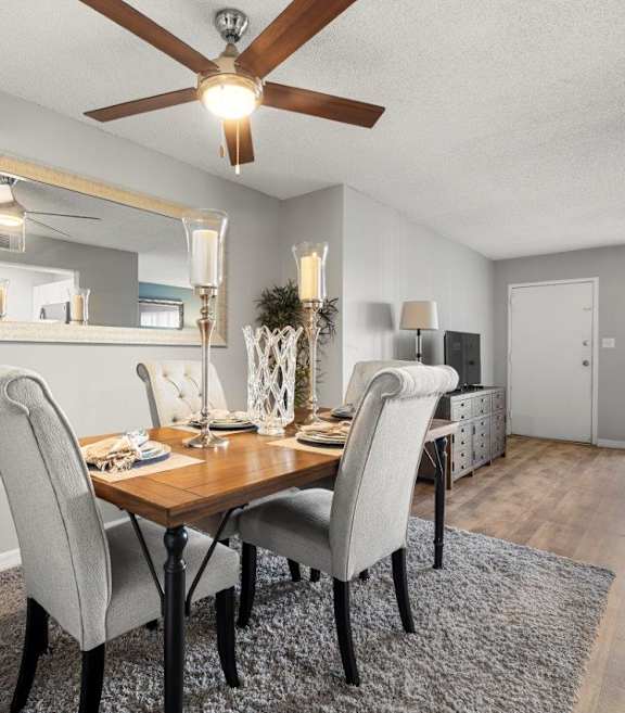 Model dining room at Oasis at Bayside Apartments in Largo, FL.