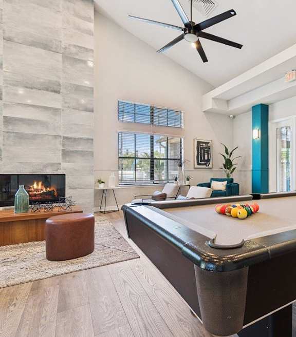 Community Clubhouse with Game Tables at Mirage at Kernan Apartment in Jacksonville, FL