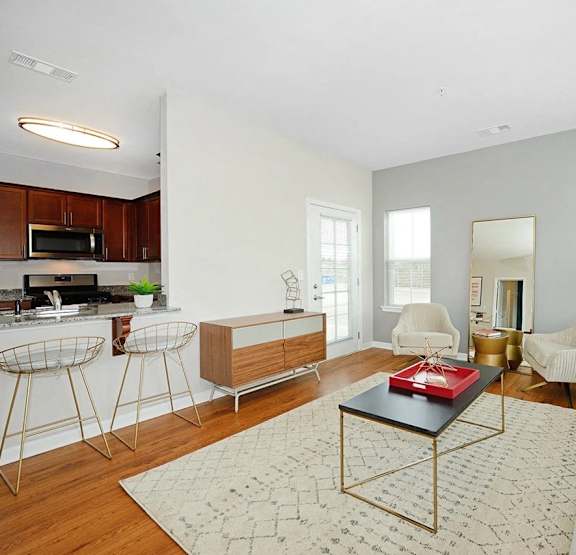 a living room with a couch and a table