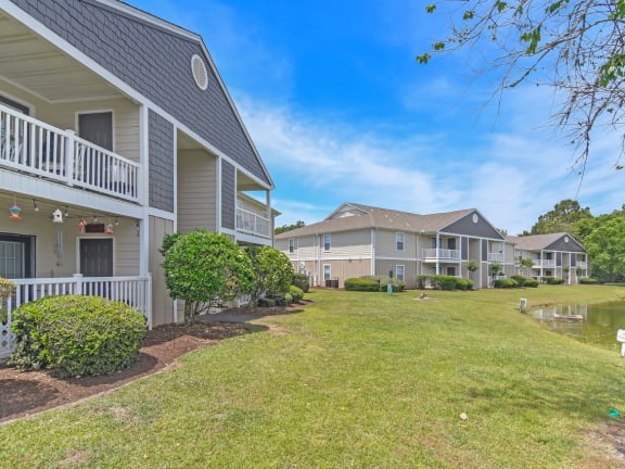 the view of a house with a pathway in front of it at The Pointe Apartment Homes, Gautier, 39553