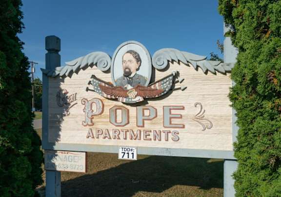 a building with a large neon sign on the front of it