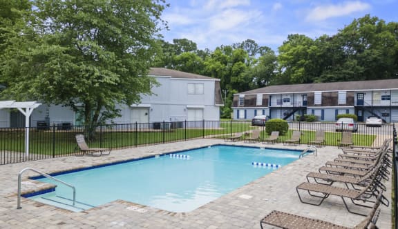 our apartments have a resort style pool with chaise lounge chairs