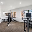 gym with window and door at San Fernando Apartments, Mesa