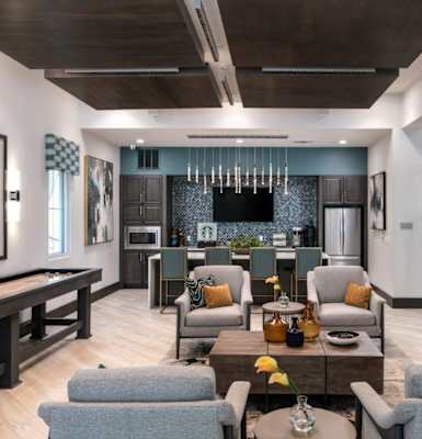 a rendering of a living room with couches and chairs at Enclave at 3230 Apartments, South Daytona, 32119