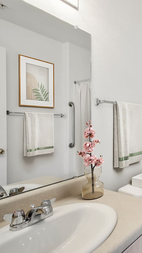 bathroom with a bathtub and curtain at San Fernando Apartments, Mesa, AZ 85205