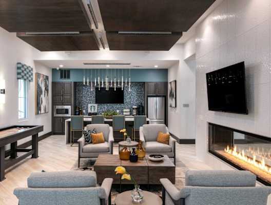 a rendering of a living room with couches and chairs at Enclave at 3230 Apartments, South Daytona, 32119