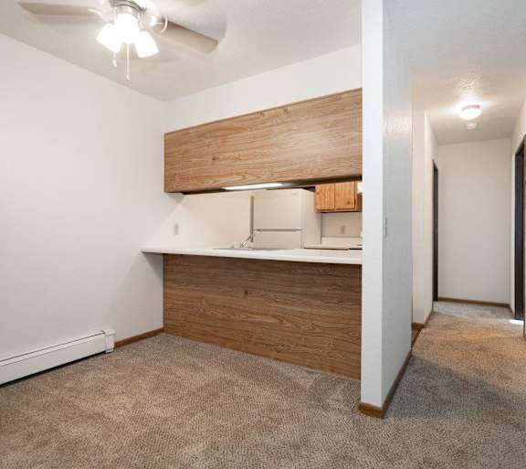 a living room with a couch and a table and a television