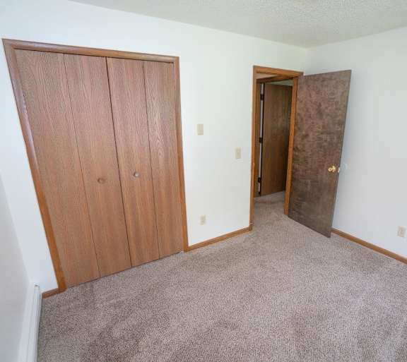 a living room with a couch and a table and a television