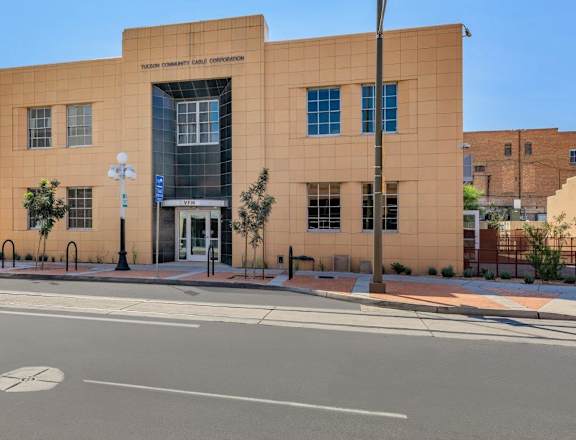 A building with a sign that says "TEXAS EMBASSY CARIBBEAN CORPORATION" on it.