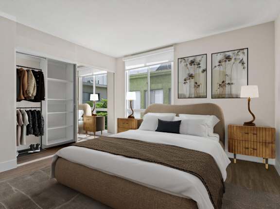 A bedroom with a large bed and a wardrobe.