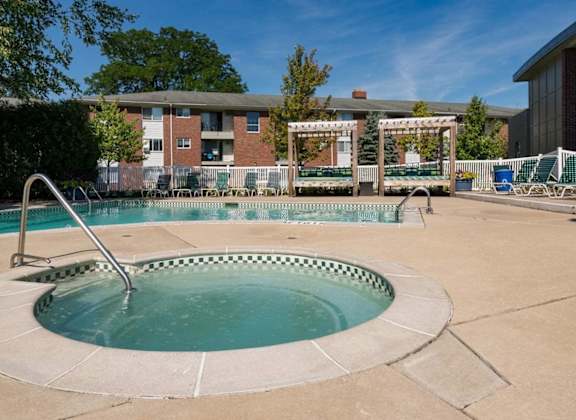 our apartments have a hot tub and a pool at Village Club of Royal Oak, Royal Oak Michigan