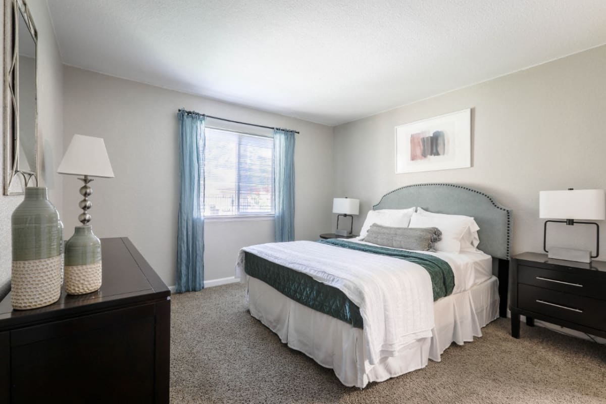 Copper Flats bedroom with carpet flooring - Aurora, CO