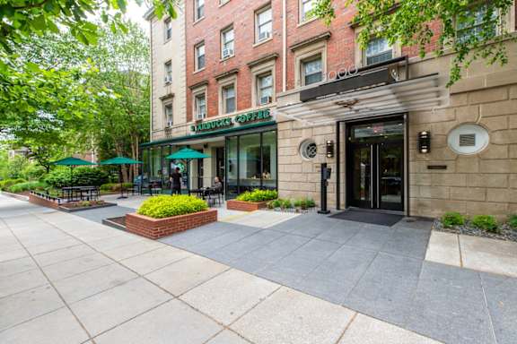 a row of shops on a city street at Cathedral Mansions in Washington, DC 20008