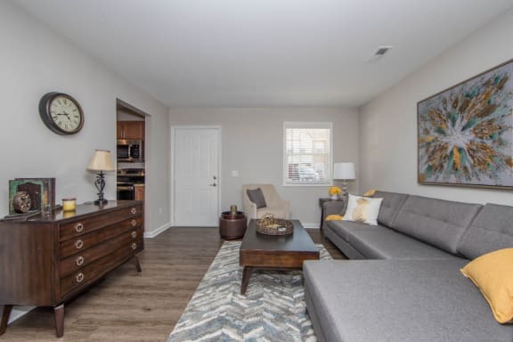 Hardwood floor living room at Villages at City Center apartments in Newport News VA