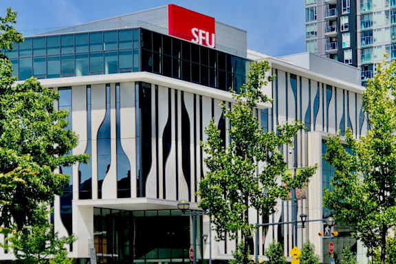 A modern building with the letters SFU on the top.