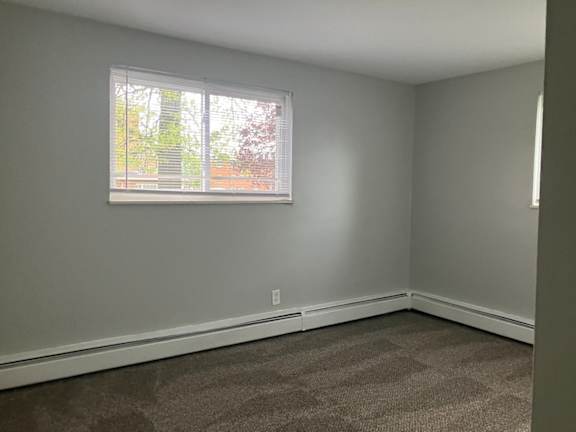 an empty room with a window in it