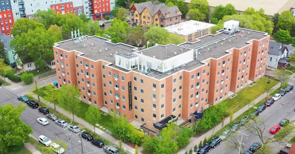 an aerial view of an apartment building in a city at Bierman Place, Minneapolis, MN, 55414