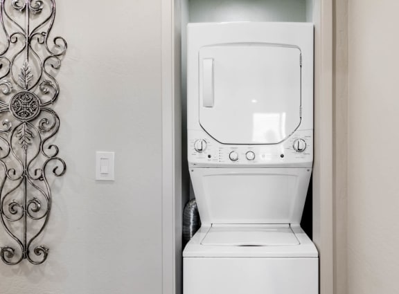 a washer and dryer in a bathroom