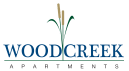 Property Logo at Woodcreek Apartments, Cary, NC