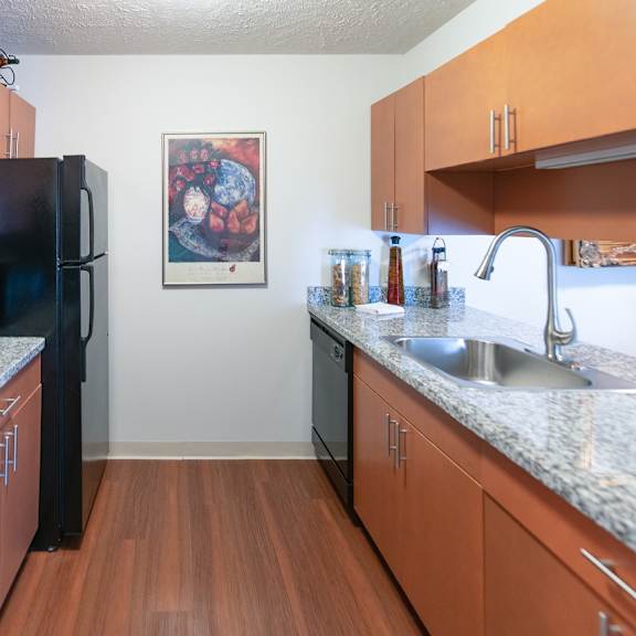 a bathroom with a sink and a toilet and a shower