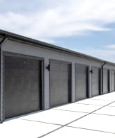 a row of garage doors on the side of a building