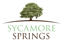 the logo or sign for the tree