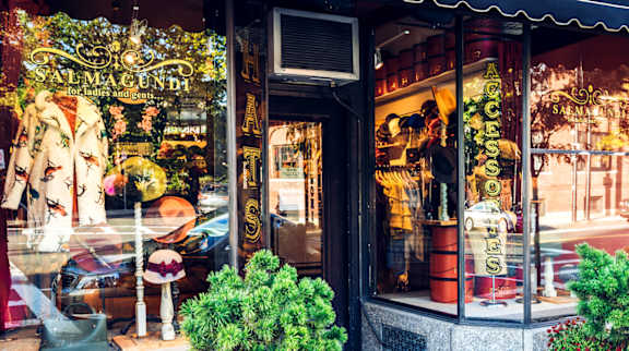 A storefront with a sign that says "SALMAGUNDI for Ladies and Gentlemen".
