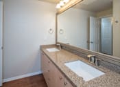 Thumbnail 19 of 23 - 3 Bedroom Apartments Glendale with Model Bathroom with Double Vanity Sink