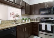 Thumbnail 1 of 33 - Gourmet Kitchen at The Preserve at Tampa Palms, Tampa, FL, 33647