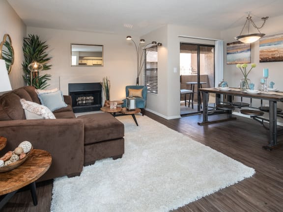 Living area with fireplace and dining area at Salado Springs, Tempe, AZ, Arizona, 85281