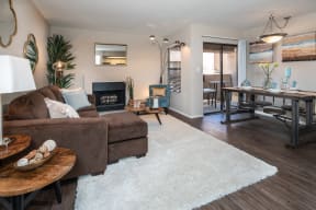 Living area with fireplace and dining area at Salado Springs, Tempe, AZ, Arizona, 85281