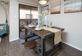 Dining area with sliding glass doors to balcony at Salado Springs, Arizona