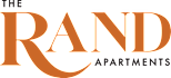 The Rand Apartments logo with orange text on a white background.