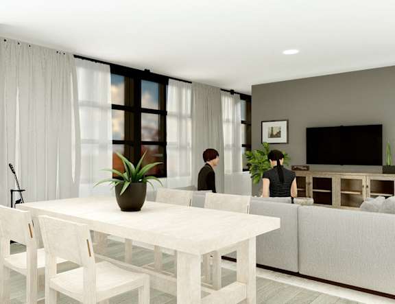 a white dining table in a living room with two people at The Pearl, Fort Wayne, Indiana