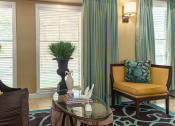 Thumbnail 19 of 55 - a living room filled with furniture and a large window