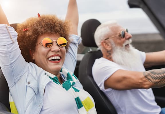Couple driving a car at Heron Pointe, Miramar, 33025