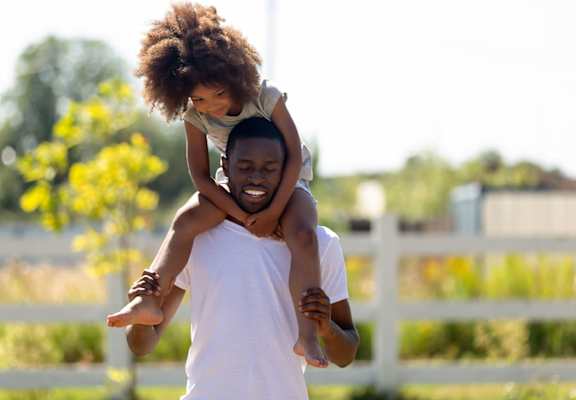 Dad and daughter in the park at Hunters Run, Middleburg, FL 32068