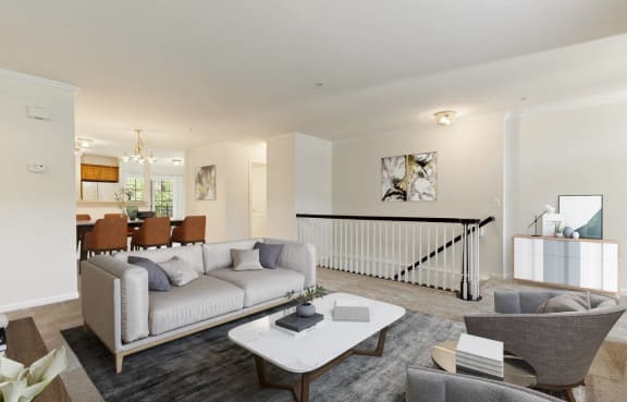 a living room with a white couch and a white coffee table at Cidermill Village, Michigan