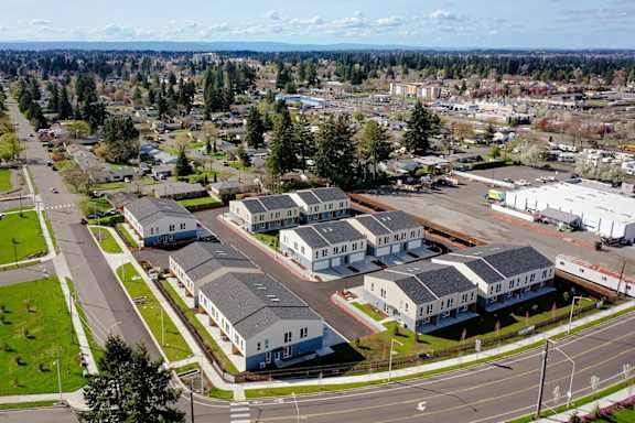 a group of houses in a suburb of a city