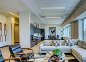 Thumbnail 13 of 33 - Apartments for Rent in Kansas City-The Grand Apartments Living Room With Large Windows With City View And Modern Decor at The Grand, Kansas City, MO, 64106