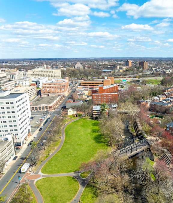 an aerial view of a park in the middle of a city at The Bell Apartments, Trenton, NJ, 08608