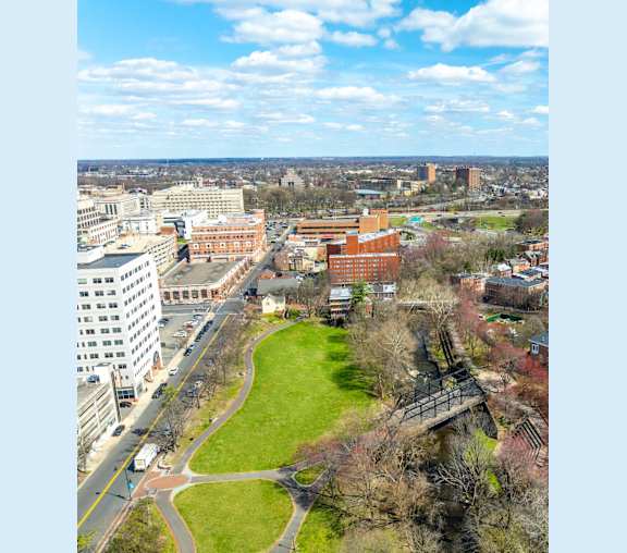 an aerial view of a park in the middle of a city at The Bell in Trenton, NJ, 08608